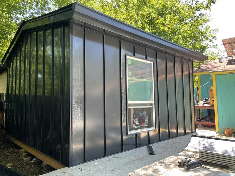 Black standing seam metal wall panels for Roof Inspection in Heath